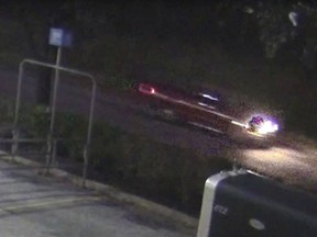 This photo provided by the Harris County Sheriff's Office shows an image taken from surveillance video of a pickup whose driver, according to authorities, fired several shots into a car carrying a family, killing a 7-year-old girl and wounding the child's mother, Sunday, Dec. 30, 2018, in the Houston area. (Courtesy of Harris County Sheriff's Office via AP)