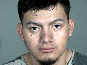 This undated photo provided by the Carson City Sheriff's Office in Carson City, Nev., shows suspect Wilbur Martinez-Guzman. Authorities investigating four recent Nevada killings say murder charges are pending against Martinez-Guzman, suspected of being in the U.S. illegally. (Carson City Sheriff's Office via AP)