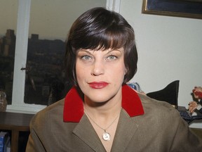 In this 1966 file photo, actress Kay Ballard poses in her home in New York. (AP Photo, File)