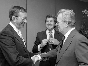 In this Sept. 10, 1979 file photo, NBA commissioner Larry O'Brien, right, shakes hands with Lawrence Weinberg, president of the Portland Trail Blazers before a hearing in New York.