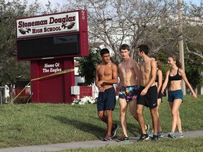 Marjory Stoneman Douglas High School track team members are seen near the front of the school on February 23, 2018 in Parkland, Florida. (Joe Raedle/Getty Images)