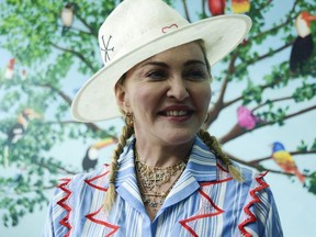 In this July 16, 2018 file photo, U.S. singer Madonna speaks to the press at a news conference in Blantyre, Malawi.