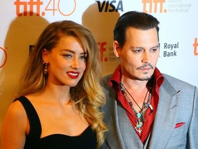 Johnny Depp with his wife Amber Heard on the red carpet for movie "Black Mass" during the Toronto International Film Festival in Toronto on Friday September 11, 2015.