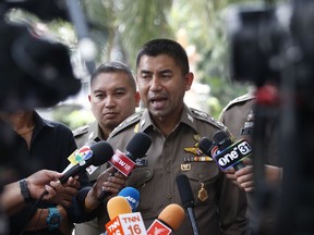 Chief of Immigration Police Maj. Gen. Surachate Hakparn talks to media about the status of Rahaf Mohammed Alqunun outside the Saudi Arabia Embassy in Bangkok Tuesday, Jan. 8, 2019.