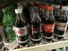 In this Oct. 1, 2014, file photo, soft drinks are displayed for sale at a market in San Francisco.