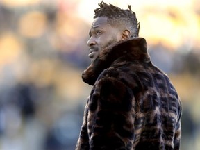 In this photo from Dec. 30, 2018, Pittsburgh Steelers wide receiver Antonio Brown stands on the sideline before an NFL football game against the Cincinnati Bengals, in Pittsburgh.