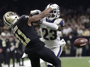 In this Jan. 20, 2019, file photo, Los Angeles Rams' Nickell Robey-Coleman breaks up a pass intended for New Orleans Saints' Tommylee Lewis during the second half of the NFL football NFC championship game in New Orleans.