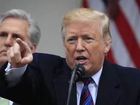 President Donald Trump speaks in the Rose Garden of the White House in Washington, joined by House Minority Leader Kevin McCarthy of Calif., and other Congressional Republican leaders, after a meeting with Congressional leaders on border security, as the government shutdown continues Friday, Jan. 4, 2019.
