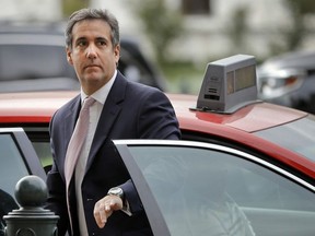 In this Sept. 19, 2017, file photo, Michael Cohen, President Donald Trump's personal attorney, steps out of a cab during his arrival on Capitol Hill in Washington.
