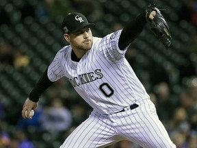 In this June 19, 2018, file photo, Colorado Rockies relief pitcher Adam Ottavino throws against the New York Mets in Denver. (AP Photo/Jack Dempsey, File)