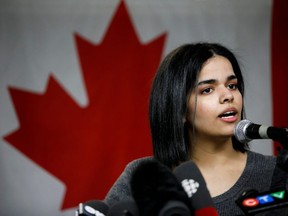 Rahaf Mohammed, 18, addresses a press conference in Toronto at the offices of COSTI, a refugee resettling agency, on Jan. 15, 2019.