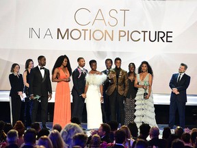 Chadwick Boseman and the cast of "Black Panter" accept the award for Cast In A Motion Picture, during the 25th Annual Screen Actors Guild Awards show at the Shrine Auditorium in Los Angeles on Jan. 27, 2019.
