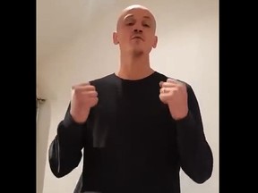 A video grab made on January 7, 2019 shows former boxer Christophe Dettinger broacasting a message of apology for punching police officers during a "yellow vest" protest in Paris. (Getty Images)