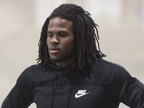 Tevaughn Campbell warms up for 60-metre sprint training at the University of Regina on March 2, 2017.