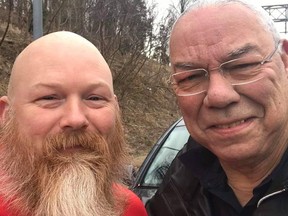 Colin Powell shared this photo of an Afghan vet who helped him with a flat tire. (Facebook)