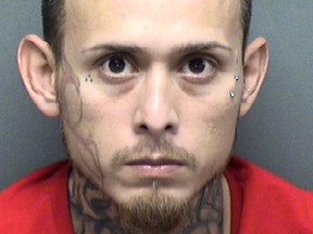 This undated photo provided by the Bexar County Sheriff's Office in San Antonio, Texas shows Christopher Davila. (Bexar County Sheriff's Office via AP)