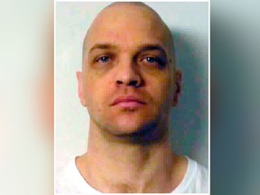 This undated file photo provided by the Nevada Department of Corrections shows death row inmate Scott Raymond Dozier, who was convicted in 2007 of robbing, killing and dismembering a 22-year-old man in Las Vegas, and was convicted in Arizona in 2005 of another murder and dismemberment near Phoenix. (Nevada Department of Corrections via AP, File)