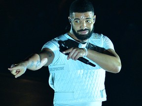 Drake performs on stage during the Drake Aubrey & The Three Migos Tour at American Airlines Arena on Nov. 13, 2018 in Miami, Fla.