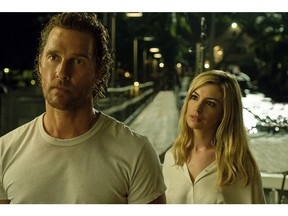 This image released by Aviron Pictures shows Matthew McConaughey, left, and Anne Hathaway in a scene from "Serenity." (Graham Bartholomew/Aviron Pictures via AP)