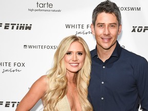 Lauren Burnham and Arie Luyendyk attend White Fox Boutique Swimwear Launch Of 100% Salty at Catch on July 26, 2018 in West Hollywood, Calif.  (Presley Ann/Getty Images)