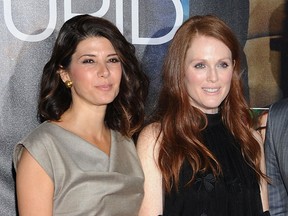 Marisa Tomei and Julianne Moore attend the "Crazy, Stupid, Love." World Premiere at the Ziegfeld Theater on July 19, 2011 in New York City.