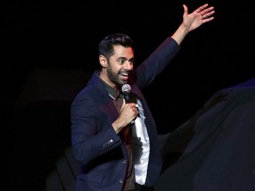 In this Nov. 7, 2017, file photo comedian Hasan Minhaj performs on stage during the 11th Annual Stand Up for Heroes benefit, presented by the New York Comedy Festival and The Bob Woodruff Foundation, at the Theater at Madison Square Garden in New York. (Photo by /) ORG XMIT: NYBZ345