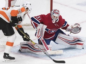 Philadelphia Flyers' James van Riemsdyk moves in on Canadiens goaltender Antti Niemi in Montreal on Saturday, Jan. 19, 2019.