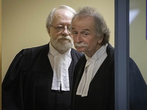 Guy Poupart, right, and Pierre Poupart, lawyers representing Adele Sorella, leave a consulting room at the courthouse in Laval, Que., on Tuesday, January 29, 2019. (THE CANADIAN PRESS/Peter McCabe)