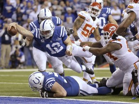 Indianapolis Colts quarterback Andrew Luck dives for a touchdown against the Chiefs during their wildcard game on Jan. 4, 2014. The Colts staged a legendary rally from a 38-10 third quarter deficit to win 45-44.