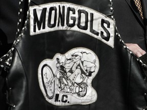 In this Tuesday, Oct. 21, 2008 file photo, a vest with the Mongols logo is held up. (AP Photo/Ric Francis)