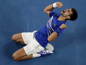 Serbia's Novak Djokovic celebrates after defeating Spain's Rafael Nadal in the men's singles final at the Australian Open in Melbourne, Australia, Sunday, Jan. 27, 2019.