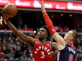 Patrick McCaw #3 of the Toronto Raptors puts up a shot in front of Sam Dekker #8 of the Washington Wizards in the second half at Capital One Arena on January 13, 2019 in Washington, DC. NOTE TO USER: User expressly acknowledges and agrees that, by downloading and or using this photograph, User is consenting to the terms and conditions of the Getty Images License Agreement. (Photo by Rob Carr/Getty Images)