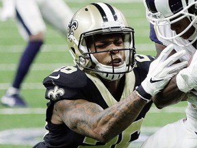 Los Angeles Rams' Brandin Cooks catches a pass in front of New Orleans Saints' P.J. Williams during the first half of the NFC championship game, Sunday, Jan. 20, 2019, in New Orleans.