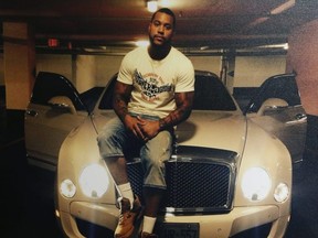 Jahmal Richardson sitting on his Bentley.