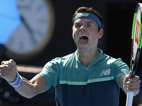 Canada's Milos Raonic celebrates after defeating Germany's Alexander Zverev at the Australian Open in Melbourne, Australia, Monday, Jan. 21, 2019. (AP Photo/Andy Brownbill)