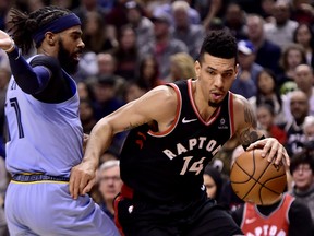 Toronto Raptors guard Danny Green makes his way down the court as Memphis Grizzlies guard Mike Conley looks on on Saturday. THE CANADIAN PRESS