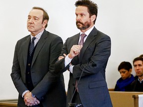 Kevin Spacey (L) attends his arraignment on sexual assault charges with his lawyer Alan Jackson at Nantucket District Court on Jan. 7, 2019 in Nantucket, Mass.