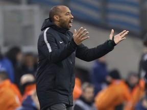Monaco coach Thierry Henry gives instructions during a League One match against Marseille at the Velodrome stadium, in Marseille, France, on Jan. 13, 2019.