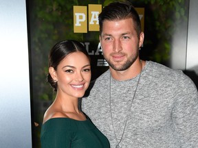 Miss Universe 2017 Demi-Leigh Nel-Peters and Tim Tebow of ESPN attend the Party At The Playoff at The GlassHouse on Jan. 5, 2019 in San Jose, Calif. (Steve Jennings/Getty Images for ESPN)