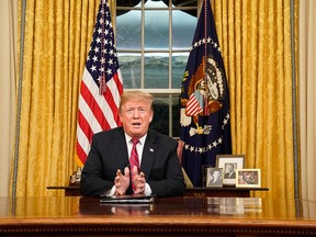 President Donald Trump speaks from the Oval Office of the White House as he gives a prime-time address about border security Tuesday, Jan. 8, 2018, in Washington.