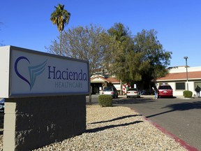 This Friday, Jan. 4, 2019, photo shows Hacienda HealthCare in Phoenix. The revelation that a Phoenix woman in a vegetative state recently gave birth has prompted Hacienda HealthCare CEO Bill Timmons to resign, putting a spotlight on the safety of long-term care settings for patients who are severely disabled or incapacitated. (AP Photo/Ross D. Franklin) ORG XMIT: AZRF101
