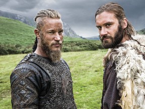 In this photo dated Aug. 28 2013, brothers Ragnar, left, and Rollo, right, leading characters from television show "Vikings." (AP Photo/Jonathan Hession/History)