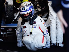 Alex Zanardi practices driver changes with team members in the BMW M8 GTE as he prepares for the IMSA 24 hour race at Daytona International Speedway, Friday, Jan. 25, 2019, in Daytona Beach, Fla.