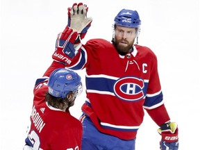 Montreal Canadiens' Shea Weber celebrates his second period goal with team-mate Jonathan Drouin during game against the Florida Panthers in Montreal on Jan. 15, 2019.