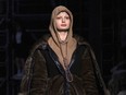 This Feb. 17, 2019 photo shows a model wearing a creation by Burberry at the Autumn/Winter 2019 fashion week runway show in London. The chief executive and chief creative officer of luxury powerhouse Burberry have apologized for putting a hoodie with strings tied in the shape of a noose on their London Fashion Week runway. Marco Gobbetti, the brand's CEO, said in a statement  that Burberry is "deeply sorry for the distress" the shirt has caused and has removed it from the autumn-winter collection. Riccardo Tisci, Burberry's creative director, also apologized. He said "while the design was inspired by a nautical theme, I realize that it was insensitive."