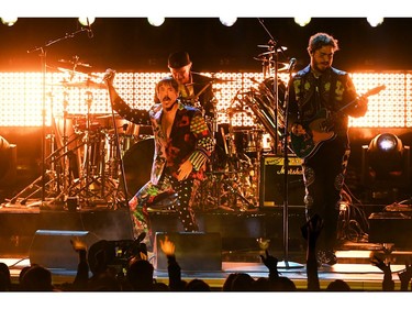 LOS ANGELES, CA - FEBRUARY 10:  (L-R) Anthony Kiedis, and Chad Smith of Red Hot Chili Peppers and Post Malone perform onstage during the 61st Annual GRAMMY Awards at Staples Center on February 10, 2019 in Los Angeles, California.