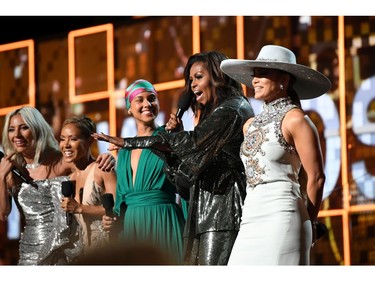 LOS ANGELES, CA - FEBRUARY 10:  (L-R) Lady Gaga, Jada Pinkett Smith, Alicia Keys, Michelle Obama, and Jennifer Lopez speak onstage during the 61st Annual GRAMMY Awards at Staples Center on February 10, 2019 in Los Angeles, California.
