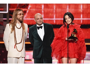 LOS ANGELES, CA - FEBRUARY 10:  (L-R) Ian Fitchuk, Daniel Tashian, and Kacey Musgraves accept the Best Country Album award for 'Golden Hour' onstage during the 61st Annual GRAMMY Awards at Staples Center on February 10, 2019 in Los Angeles, California.