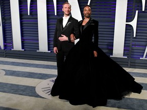 Adam Smith, left, and Billy Porter attend the 2019 Vanity Fair Oscar Party hosted by Radhika Jones at Wallis Annenberg Center for the Performing Arts on Feb. 24, 2019 in Beverly Hills, Calif.  (Dia Dipasupil/Getty Images)