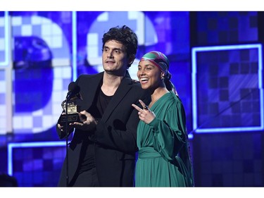 LOS ANGELES, CALIFORNIA - FEBRUARY 10: John Mayer and host Alicia Keys speak onstage during the 61st Annual GRAMMY Awards at Staples Center on February 10, 2019 in Los Angeles, California.